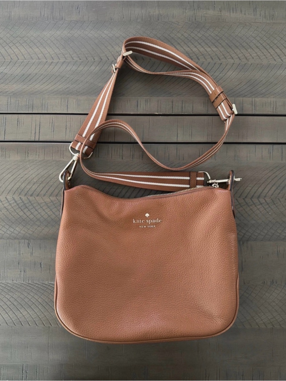 kate spade Pebbled Leather Crossbody in Cognac with Striped Strap